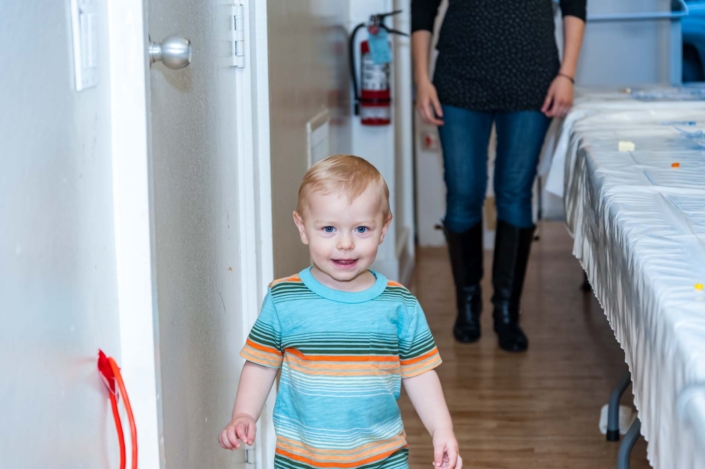 A picture of a young child and his mother at the Ladies Night 2019 dinner.