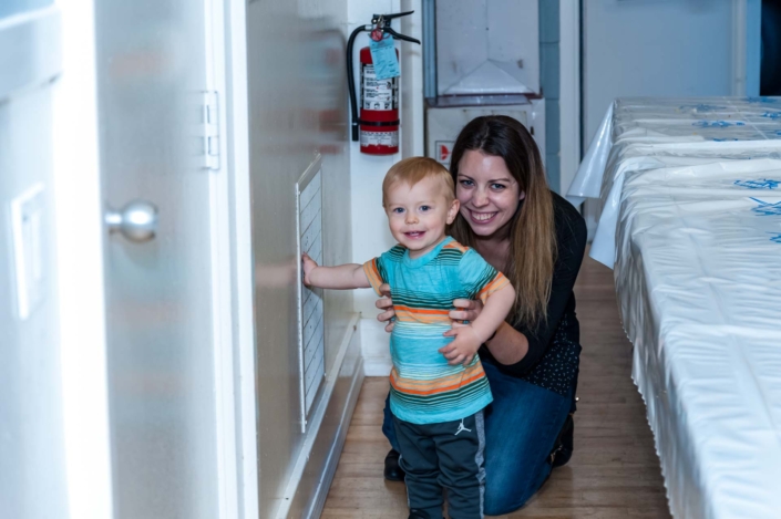 A picture of a young child and his mother at the Ladies Night 2019 dinner.