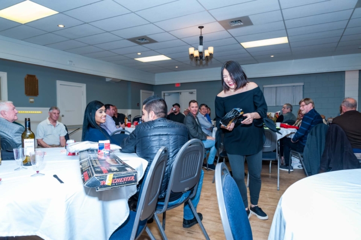 A photo of a female laughing at the Ladies night 2019 dinner.