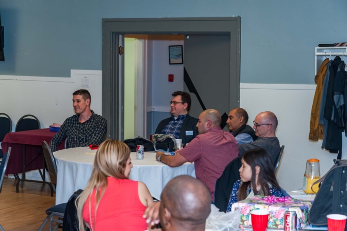A photo of various members at their table at the ladies night 2019 dinner.